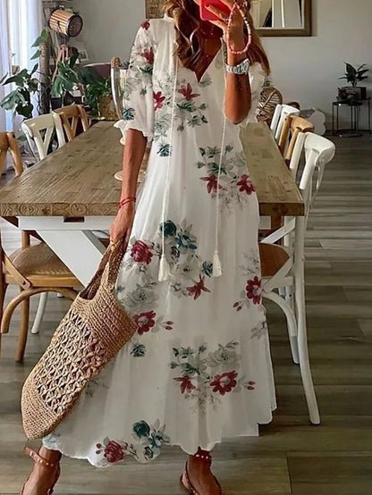 Robe longue Giselle | Imprimé géométrique, manches lanternes et coupe trapèze 12